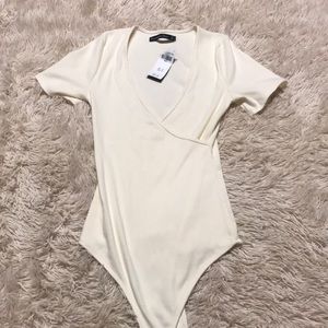 Cream wrap-front bodysuit